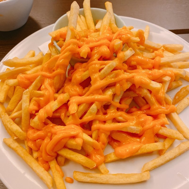 こぼれプライドポテト チェダーチーズソースがけ(神戸ハーバーランド温泉 万葉倶楽部)