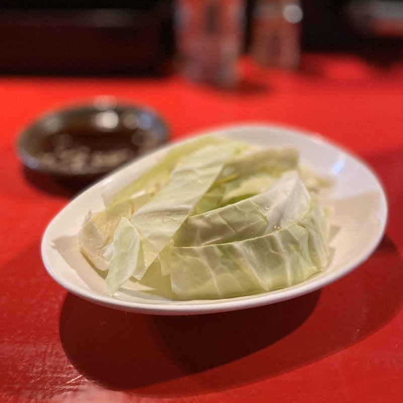 お通し(牛串焼き 新羅)