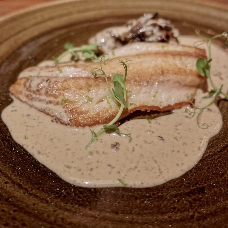 北海道産 真鱈と海の幸のブレゼ 季節野菜とサフランコンソメ(レークハウス)