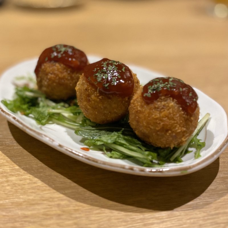 蟹味噌メンチクリームアランチーニ(豚都)