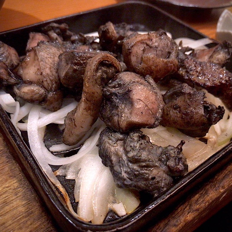 万作式もも肉炭火焼き 親鳥『はごたえ』(宮崎料理 万作 大名古屋ビルヂング店)