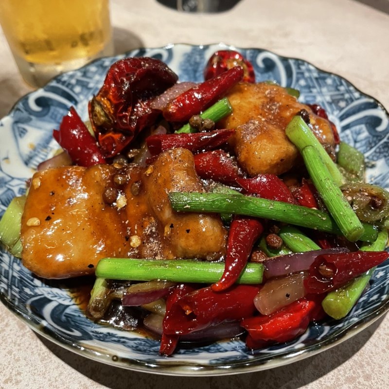 豚肉とニンニク芽の花椒炒め(DRA三茶)