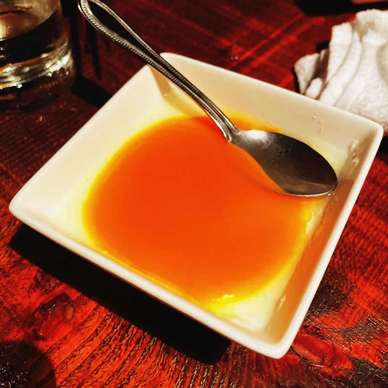 自家製 杏仁プリン マンゴーソース(博多やさい巻き串屋ねじけもん自由が丘別邸)