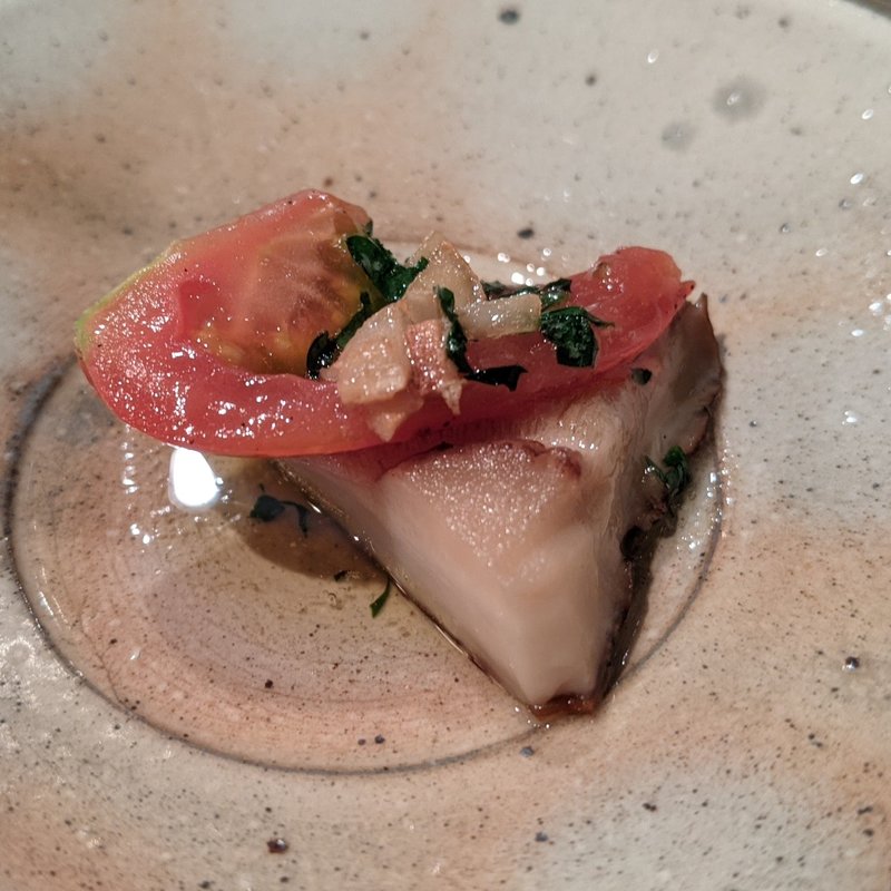 椎茸とトマトのニンニクバター(ヴィネリア セコンド イル グスト)