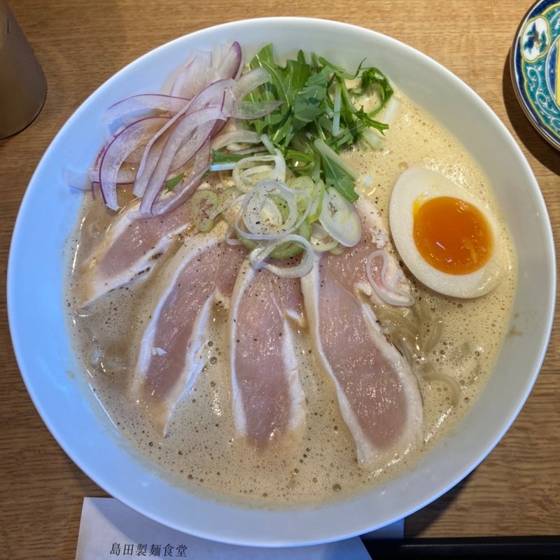 濃厚伊勢海老味噌ラーメン味玉半分入り(島田製麺食堂 鶏白湯専門店)