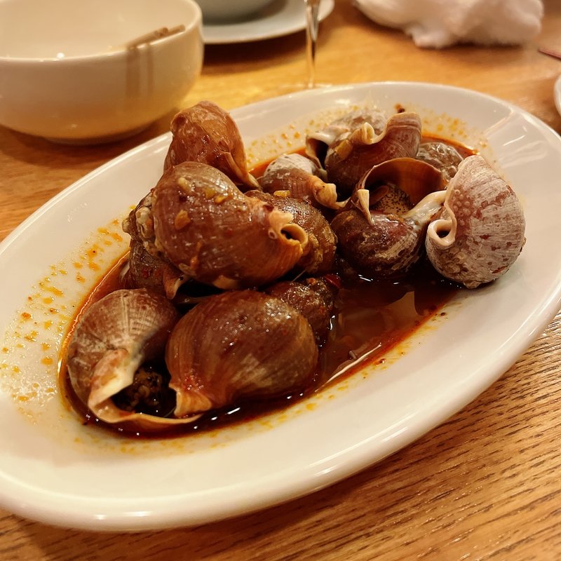 磯つぶ貝の紹興酒麻辣(サエキ飯店)