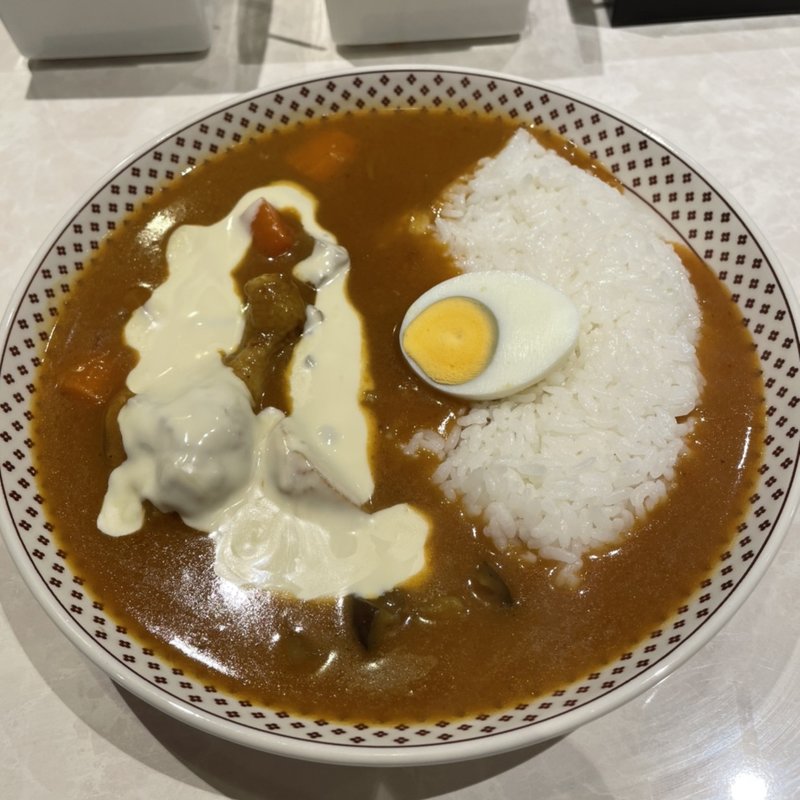 スタミナカレー　チーズトッピング(モンスナック 新宿野村ビル店)