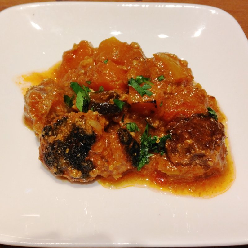 お通し（豚肉のトマトソース煮）(トスカーナ鶴見シァル店 )