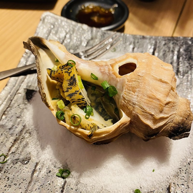 つぶ貝とキノコのアヒージョ(大衆酒場 北海道ながまれ 外苑前)