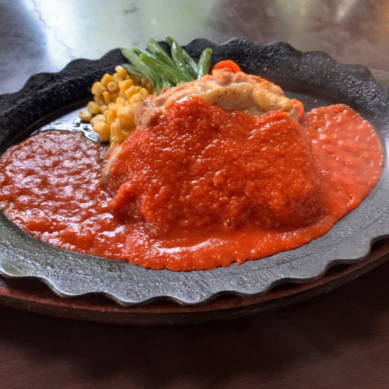 地養鶏のソテー　ガーリックトマトソース(レストラン　高原)