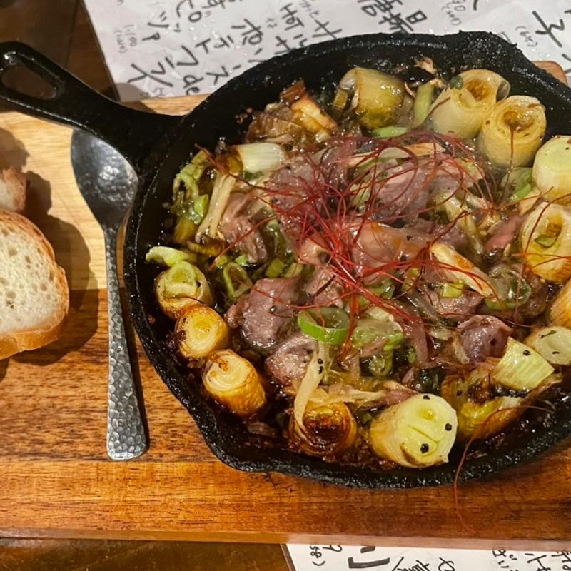 砂肝と長ネギのアヒージョ(牡蠣としゅうこと時々かねこ)