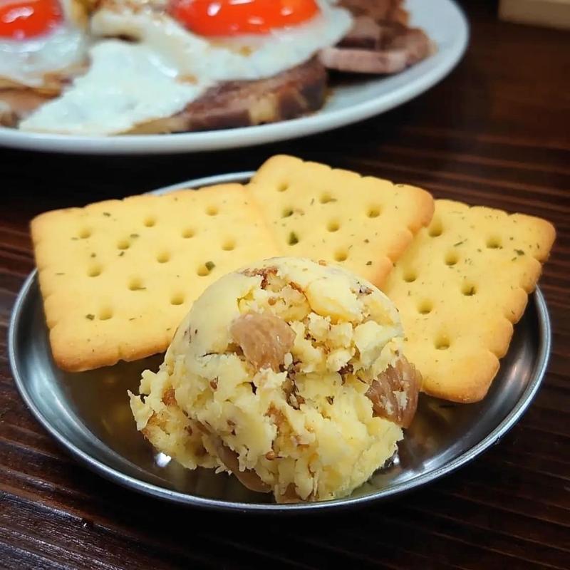 クリームチーズいぶりがっこ(大衆食堂スタンドそのだ)