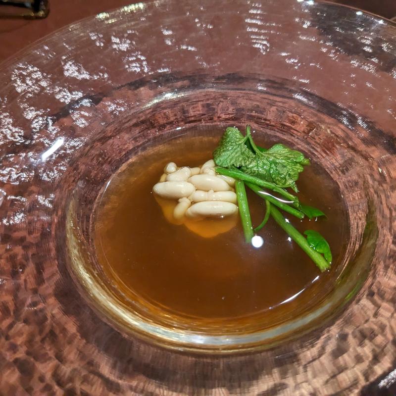 天然鴨のコンソメ　タラの白子添え(オステリア・アウストロ （Osteria Austro）)