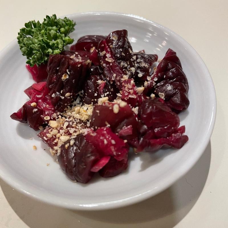 口直し（京都市西田屋きゅうりの柴漬け）(和風もつ料理 あらた )