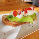Avocado, cottage cheese, radishes and seeds mix