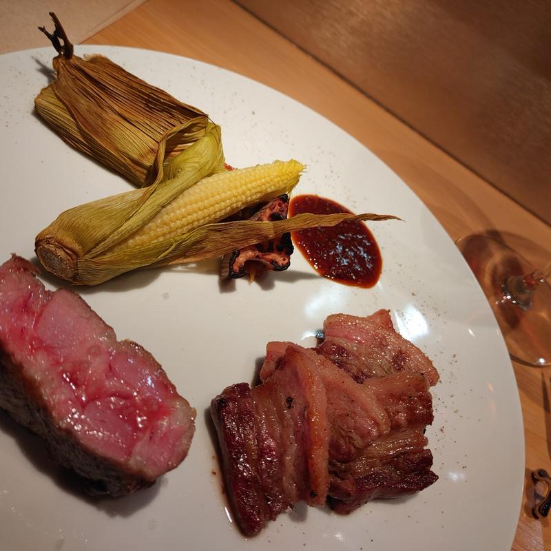 四万十ダバダ豚と猪の炭火焼き(Rigutta)