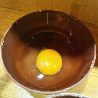 生卵(元祖スタミナ満点らーめんすず鬼赤坂店)