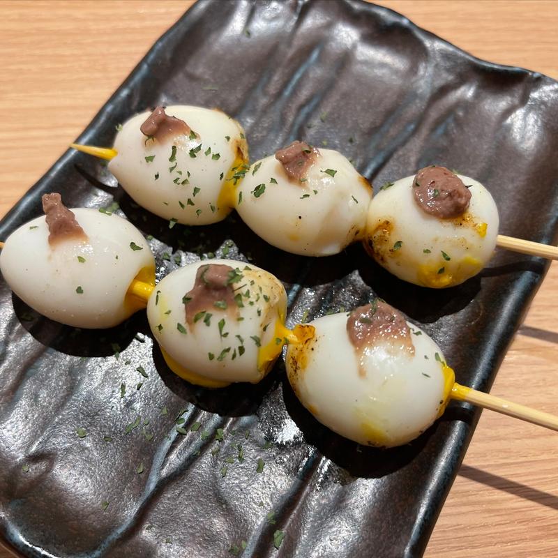 半熟うずら卵（アンチョビのせ）(焼き鳥　きんざん　住吉店)