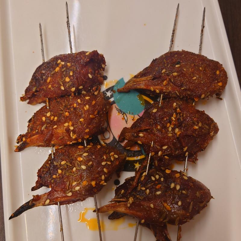 鶏の頭(沸騰焼烤猪小妖)