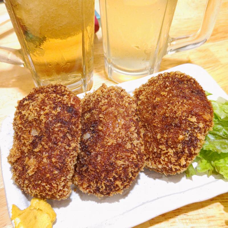 牛肉100%メンチカツ(もつ焼き串焼き 肉の佐藤 藤沢店)