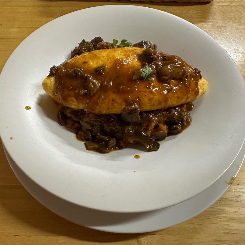 能登牛すね肉のハヤシオムライス（サラダドリンク付）(ビストロシャレ )