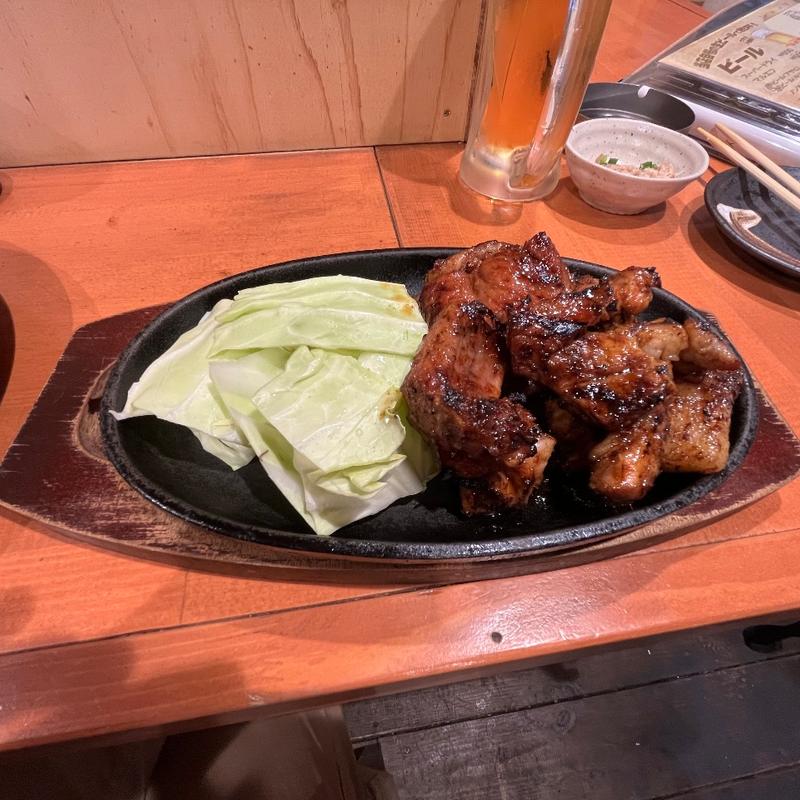 骨付きカルビ(焼鳥酒場 くるくる)