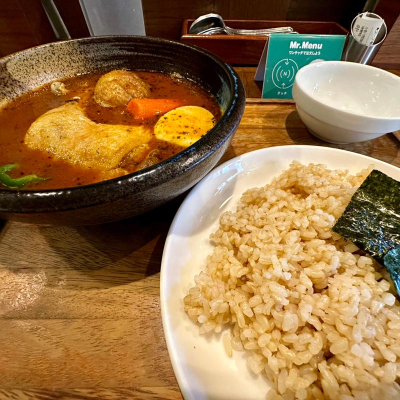 骨付きチキンのスープカレー(カレー食堂 心 下北沢店)