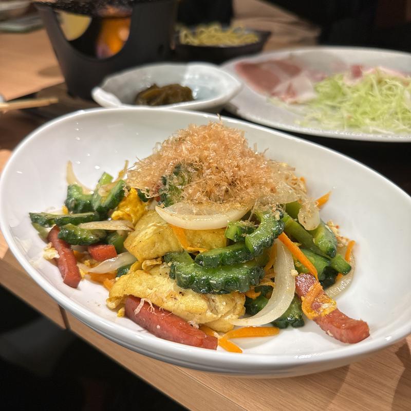 ゴーヤちゃんぷるー(島ぎょうざ心心マルエイガレリア店)