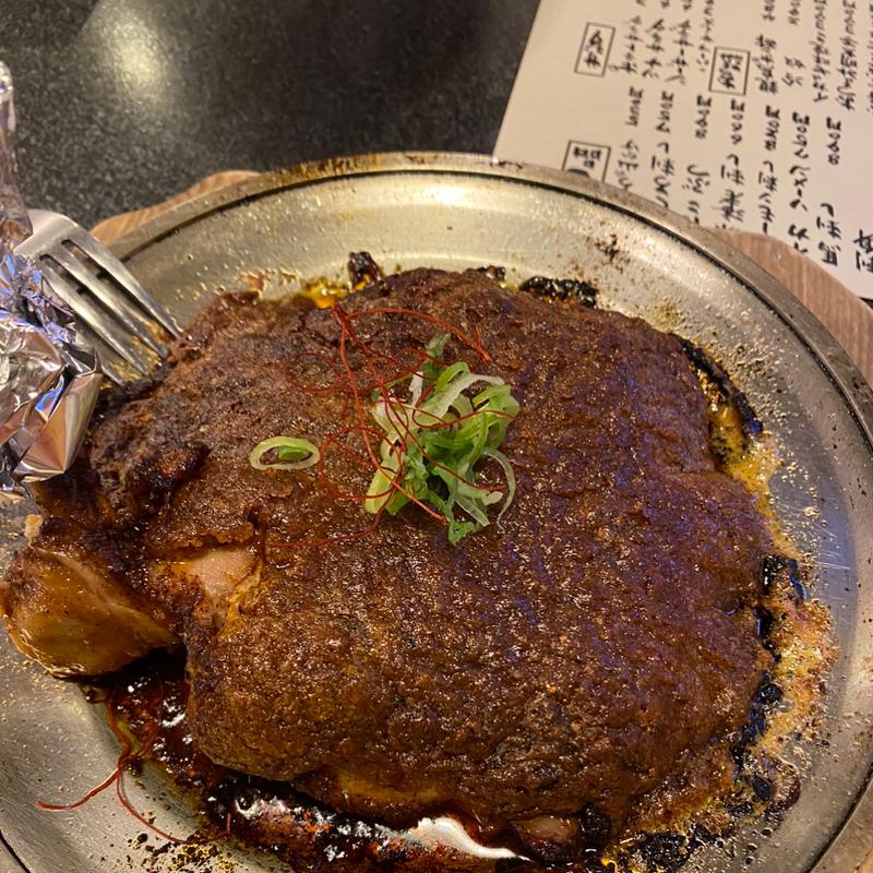 名物　鶏ももの文蔵焼き(鍛冶屋 文蔵 多摩センター店)