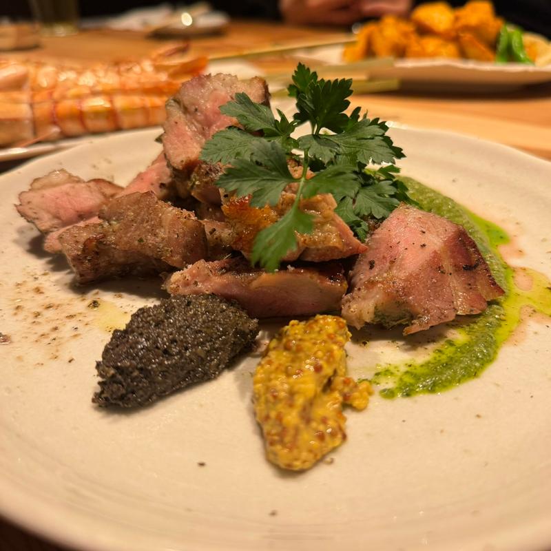 塊り肉の炭火ポルケッタ(みみずく 名駅店)