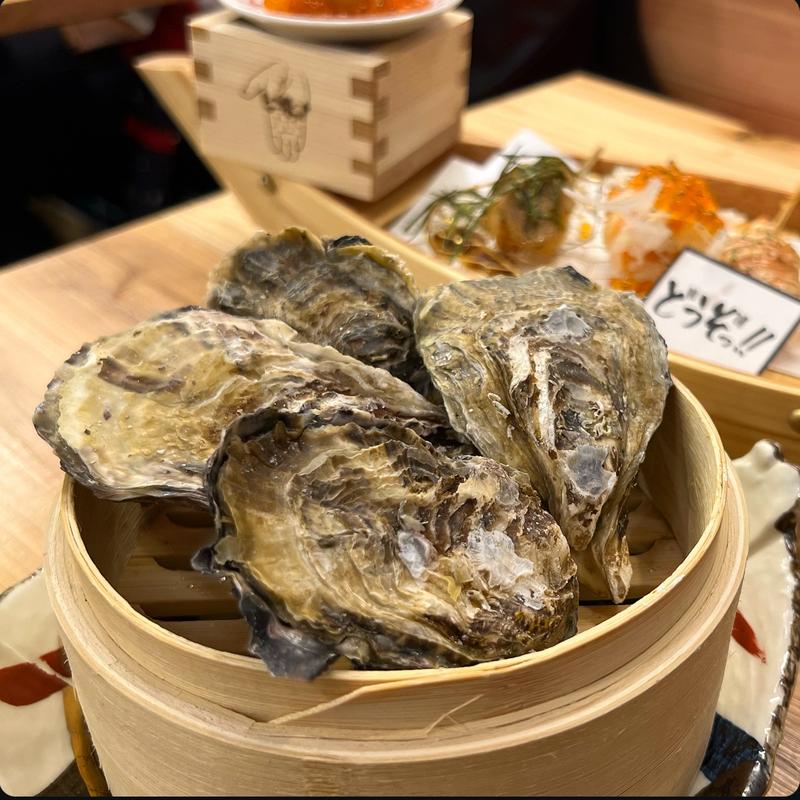 蒸し牡蠣(スシクシ酒場 どうぞっ！ 京都駅北店)