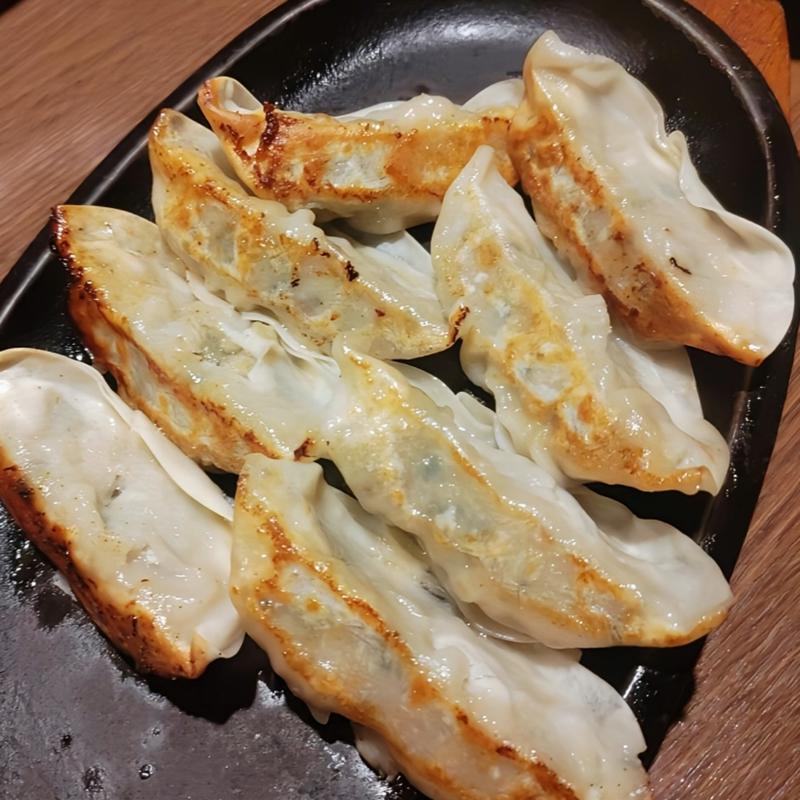 鉄鍋餃子(居酒屋 まる家 西中洲 （まるや）)