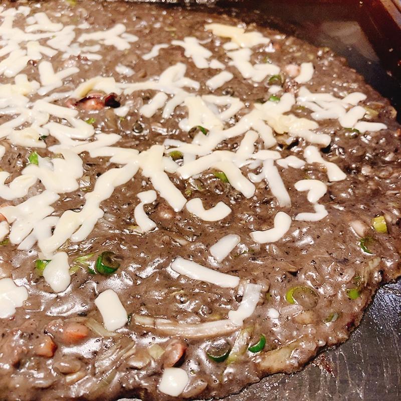 イカ墨もんじゃ（チーズトッピング）(月島もんじゃ もへじ 広島駅)