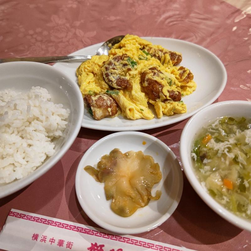 蛸の下足と分葱の玉子炒め(獅門酒楼)