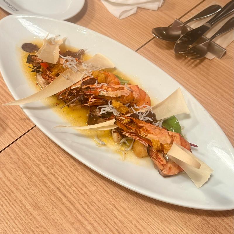 本日鮮魚と有頭海老のグリル  雲丹・釜揚シラスのアヒージョ仕立て(ブルーオーシャングリル )