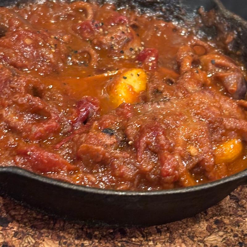 いいだこの激辛トマト煮込み(五感 池袋西口店)