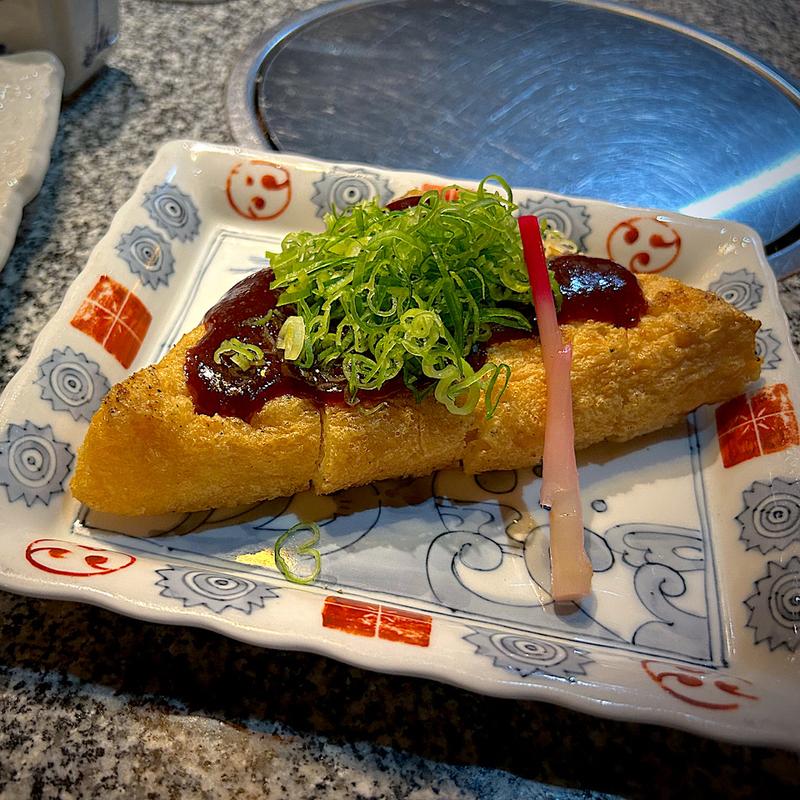 定義山の三角油揚焼(伊達な郷土料理と原始焼 牡鹿半島 仙台駅前店 （牡鹿半島）)