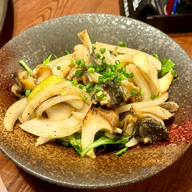 つぶ貝とエリンギ炒め(居酒屋 写楽)