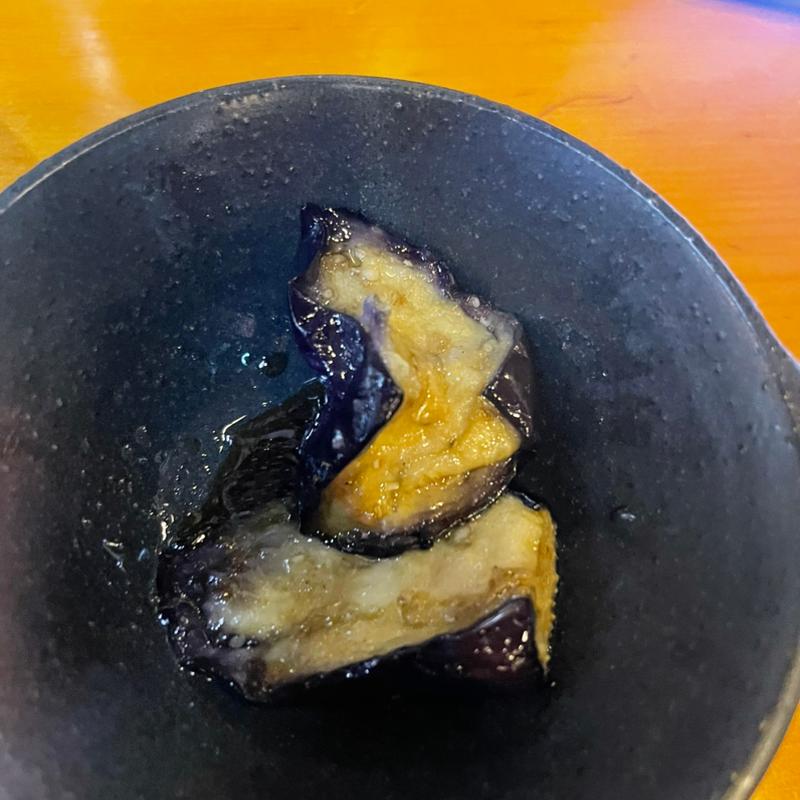 お通し　茄子の揚げ浸し(居酒屋 だるま亭)
