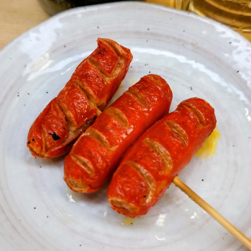 赤ウィンナー串(もつ焼き串焼き 肉の佐藤 横浜西口店)