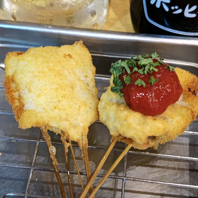 鱧串・ズッキーニの豚巻き(串かつ でんがな 上大岡camio店)