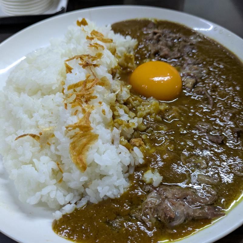 牛すじカレー並盛 玉子（生）トッピング(牛すじカレー 小さなカレー家 大久保店)