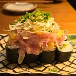 トロたくのっけ寿司