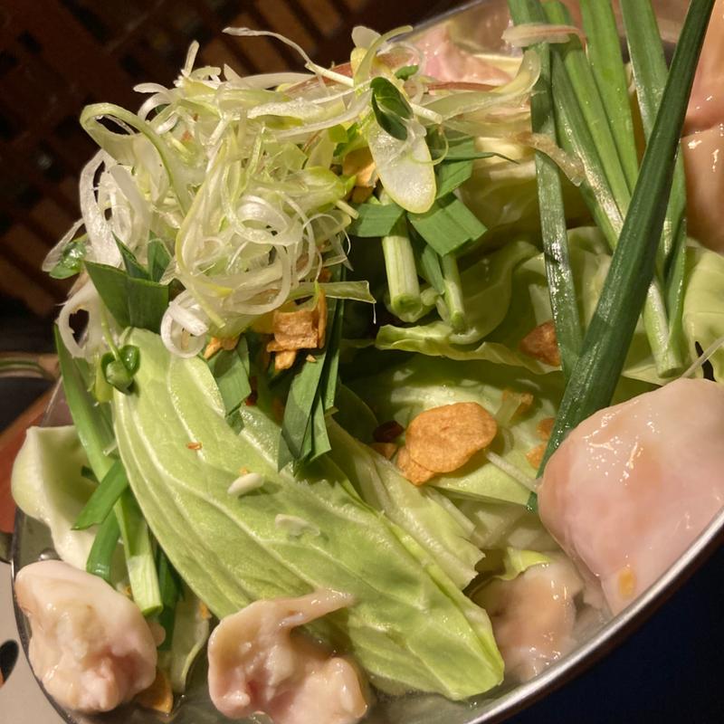 モツ鍋(炭火野菜巻き串と餃子 博多うずまき 海浜幕張店)