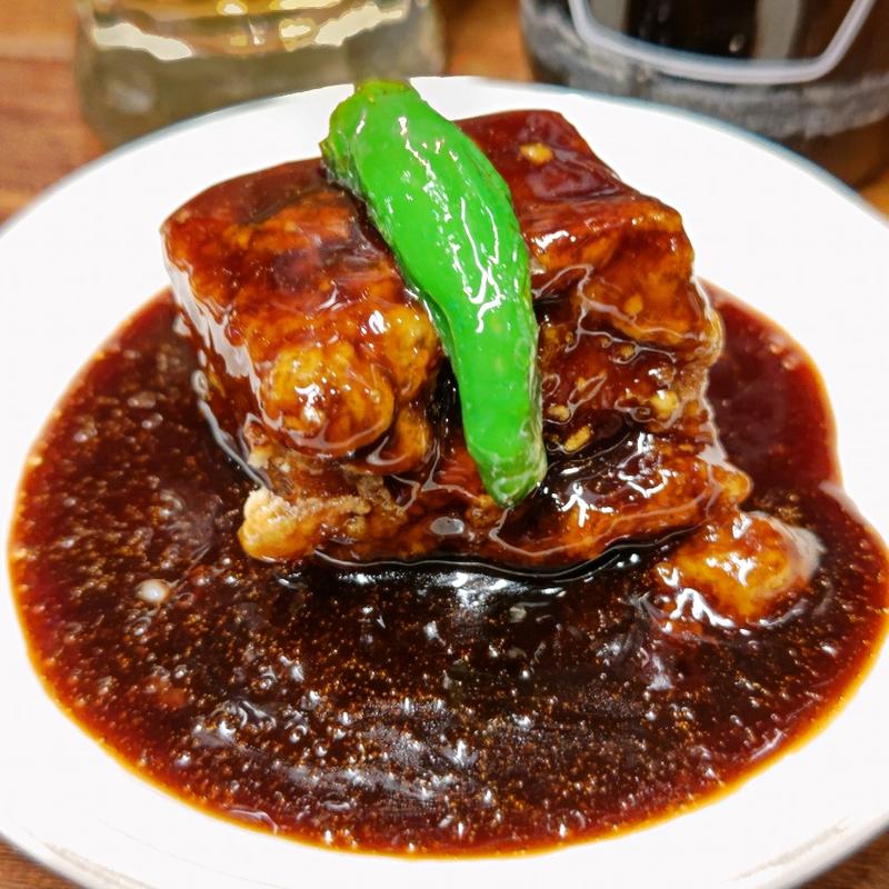 四角い黒酢ぶた(焼売スタンド きんぎょ)