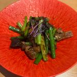 穴子の肝とニンニクの芽炒め