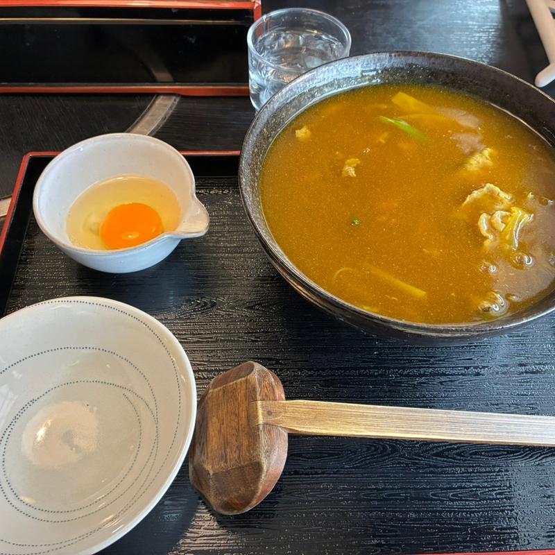 カレーうどんに生卵トッピング(開化亭 （かいかてい）)